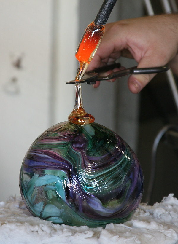 adding molten glass for the hanger