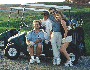 31-barb_dick_doug_steph_golf_cart.gif - 7734 Bytes